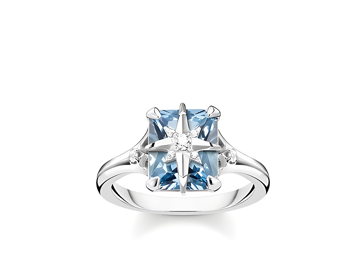 Thomas Sabo TR2288-644-1-50 Ring aus Silber mit blauem Stein in Größe 50, präsentiert einen eleganten, funkelnden Stein in sternförmiger Fassung, ideal für besondere Anlässe.