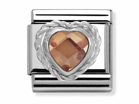 433060324-0 Facettiertes Herz aus Sterling Silber in Champagner, umrahmt von feinem Silber mit einem verschnörkelten Rand, ideal für Schmuckliebhaber und als modisches Accessoire.