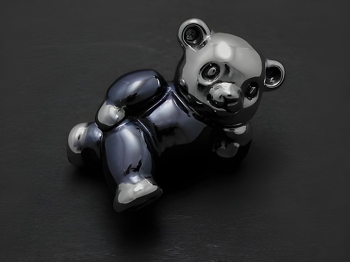 Silber Figur - Teddybär liegend rhodiniert - anthrazit niedlich, Hersteller: Juwelier Harnisch, Echtsilber Figuren, ideal als Geschenk oder Sammlerstück für Liebhaber hochwertiger Dekoration.