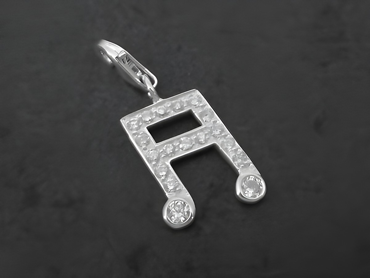 Charms Anhänger in Form einer Note aus Sterling Silber mit Zirkonia, Hersteller Juwelier Harnisch, ideal für Musikliebhaber.