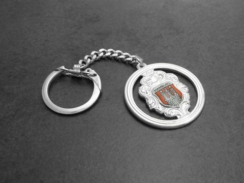 62729-0 Schlüsselanhänger mit Wappen von Hamburg, versilbert und rund, Hersteller Juwelier Harnisch, silberfarben, ideal als Erinnerung oder Souvenir.