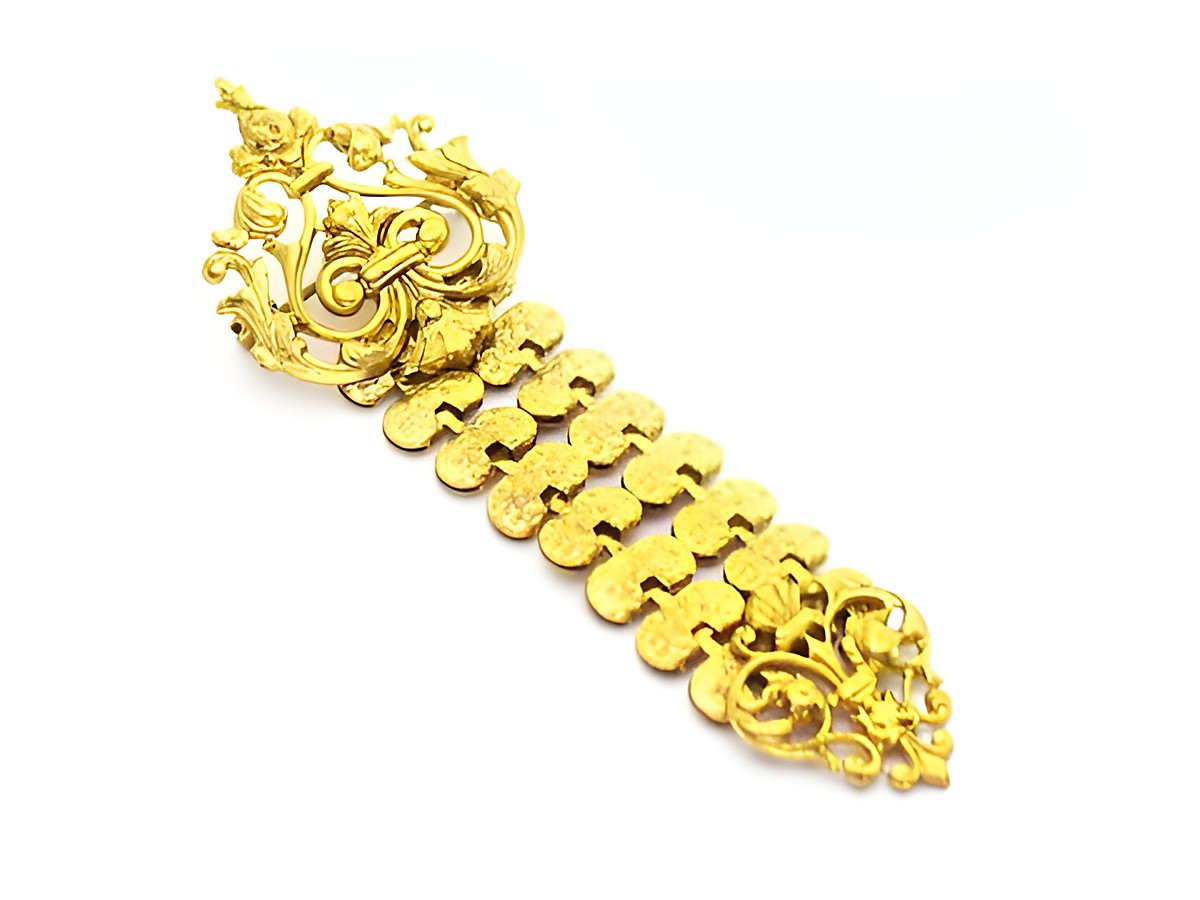 Brosche in verschlungenem Gold-Look und neu, Hersteller Juwelier Harnisch, Modeschmuck mit filigranem Design und glänzender Oberfläche. Ideal zum Veredeln von Kleidung und Accessoires.
