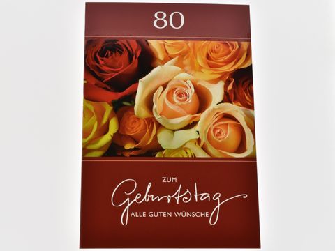 Geburtstagskarte mit Rosenblüten in verschiedenen Farben und der Aufschrift zum Geburtstag alle guten Wünsche in elegantem Schriftzug, Hersteller Juwelier Harnisch, für einen 80. Geburtstag.