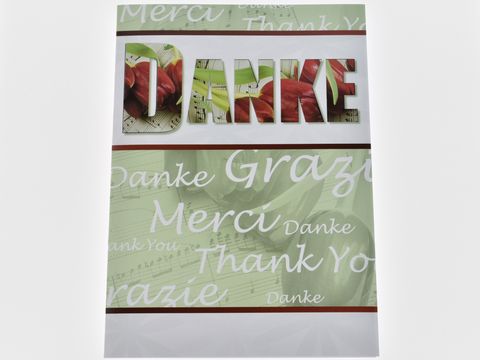 Dankeskarte mit dem Schriftzug Danke, umgeben von Notenblättern und Tulpenmotiven, hergestellt von Juwelier Harnisch, ideal für Dankesbotschaften.