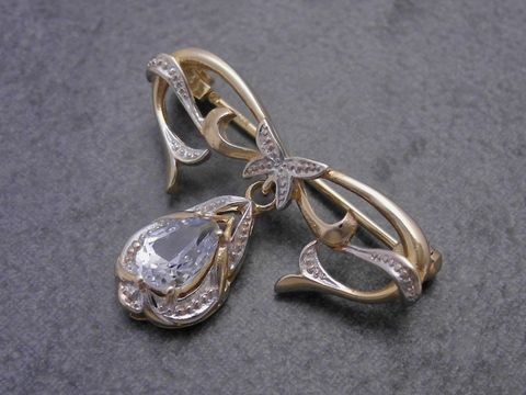 Gold Brosche - anmutig - Gold 333 - synth. Aqua - Anstecknadel, Hersteller: Juwelier Harnisch, Broschen, mit elegantem Design und tropfenförmigem Stein in der Mitte.