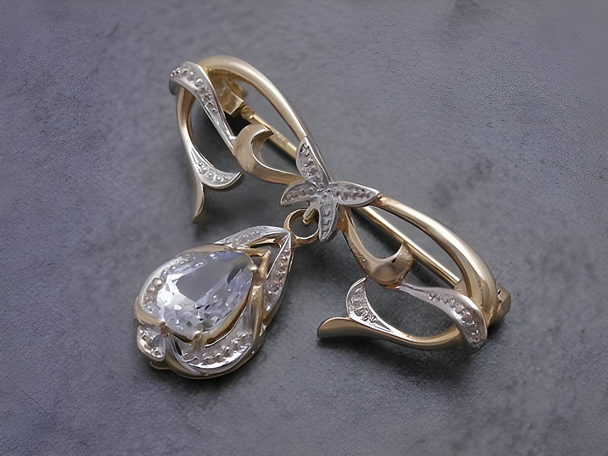 Gold Brosche - anmutig - Gold 333 - synth. Aqua - Anstecknadel, Hersteller: Juwelier Harnisch, Broschen, mit elegantem Design und tropfenförmigem Stein in der Mitte.