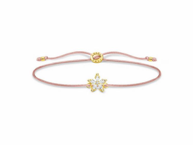Thomas Sabo Armband LS119-379-19-L20V aus Sterling Silber in vergoldetem Gelb, kombiniert mit Nylon und beige Zirkonia, verstellbar von 13 bis 20 cm. Elegantes Design für stilvolle Akzente.
