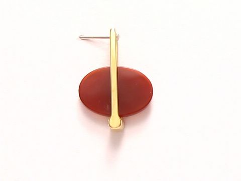 Ovaler Karneol Anhänger mit Gold Auflage von Juwelier Harnisch, eleganter Schmuckstück in warmen Rottönen, ideal für besondere Anlässe oder als modisches Statement.