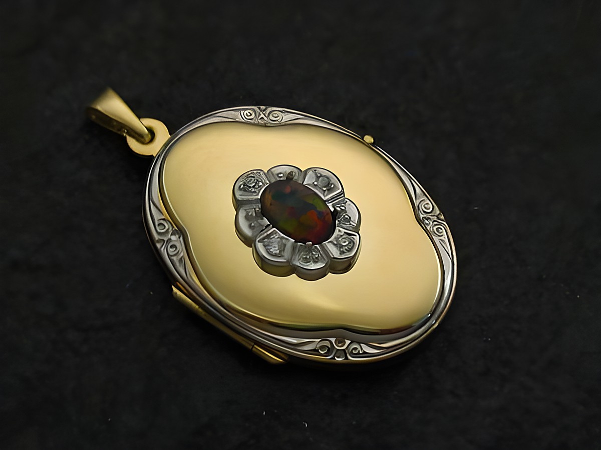 Bunt schimmernder Opal Cabochon in einem bicolor Gold 333 Medaillon mit filigraner Umrandung, hochwertiger Schmuck vom Juwelier Harnisch, elegantes Design und besondere Ausstrahlung.