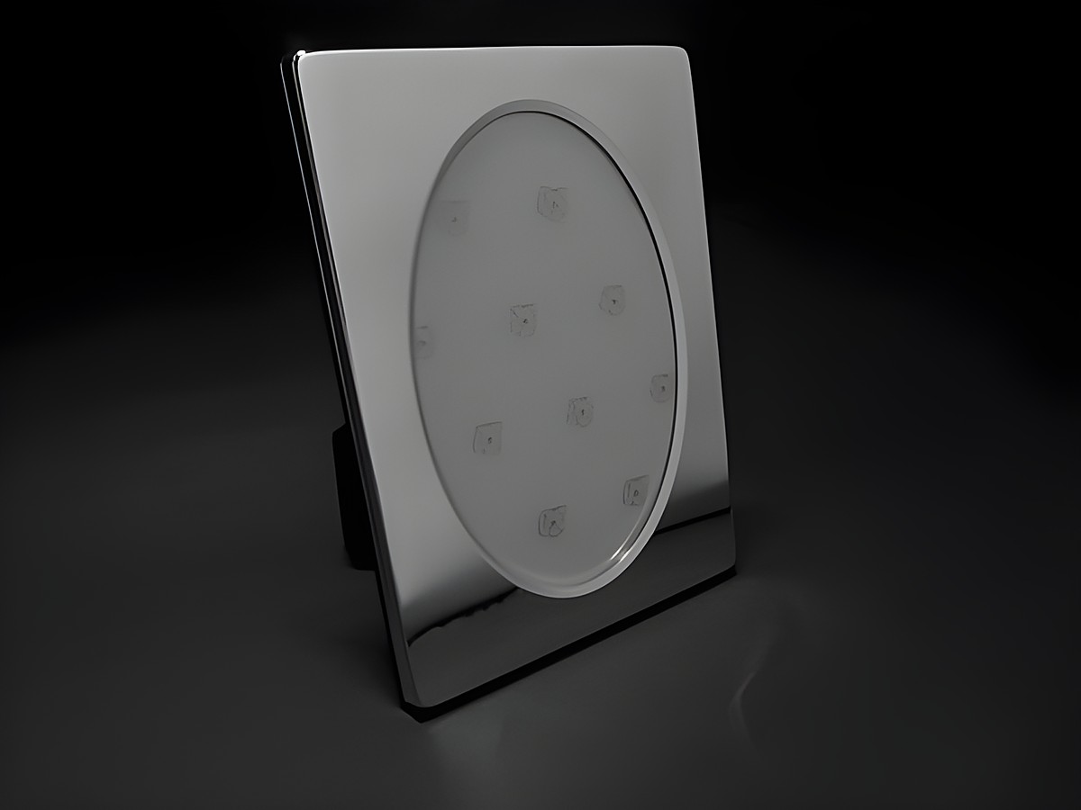 Versilberter ovaler Bilderrahmen für Fotogröße 15 x 10 cm, elegant gestaltet mit einer glatten Oberfläche, ideal für die Präsentation von Erinnerungsfotos, Hersteller Juwelier Harnisch.