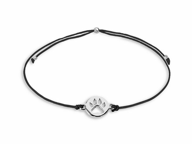 Xenox Sterling Silber Armband XS1678 mit einem runden Anhänger in Pfotenform, auf schwarzem Band, minimalistisches Design für tierliebende Menschen.