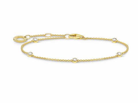 Silbernes Armband aus der Thomas Sabo Charming Collection mit gelbgoldenen Akzenten und klaren Zirkonia-Steinen, verstellbare Länge von 16 bis 19 cm, elegantes Design für jeden Anlass.