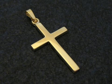 Ein schlichtes Goldkreuz in den Maßen 28x16x1,5mm aus Gold 333, hergestellt von Juwelier Harnisch, klassisches Design.