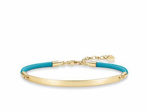 Silber vergoldetes Love Bridge Armband von Thomas Sabo mit hellblauem Nylonband, verstellbar von 16,5 bis 19,5 cm, elegantes Design für jeden Anlass.