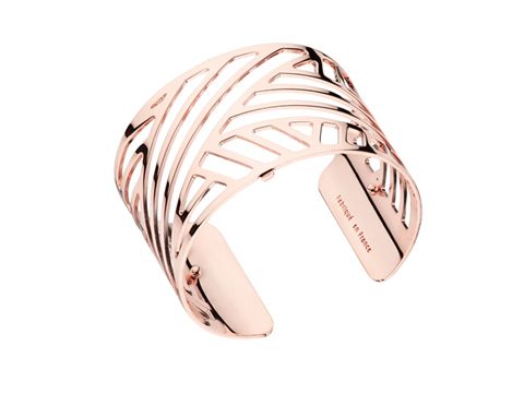 Ein eleganter Armreif aus Roségold mit einem modernen, gewellten Design und offenen Details, ideal zur Kombination mit verschiedenen Outfits, Hersteller Les Georgettes, 40 mm.