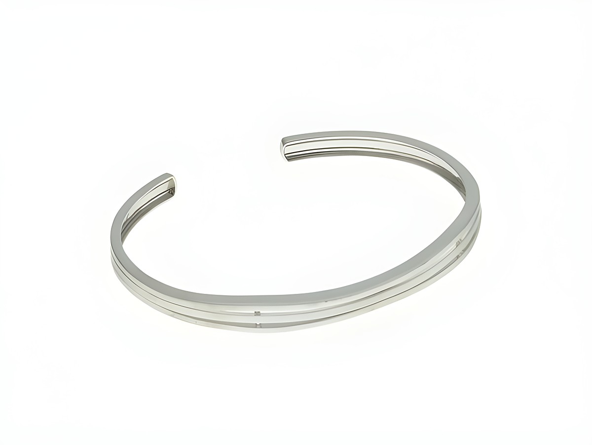 Chick Armreifen aus rhodiniertem Sterling Silber, elegante und schlichte Linienführung, ideal für den täglichen Gebrauch, Hersteller Juwelier Harnisch, Länge 18 cm.