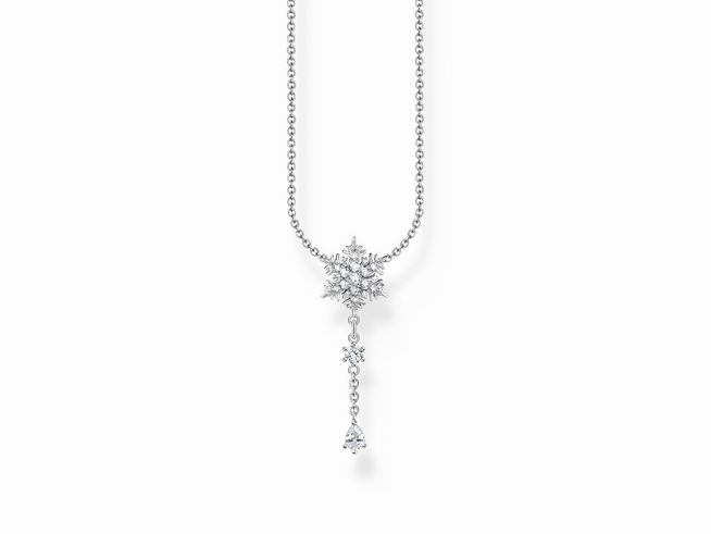 Die Kette von Thomas Sabo besteht aus Sterling Silber und trägt einen filigranen Schneeflocken-Anhänger, der mit Zirkonia verziert ist, und hat eine elegante, funkelnde Erscheinung.