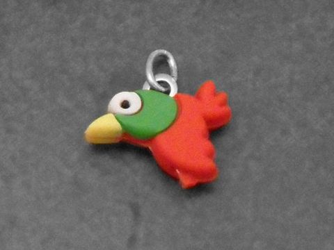 Bunter Vogel Kautschuk Silber Anhänger für Kinder, hergestellt von Juwelier Harnisch, ideal als tierisches Schmuckstück für kleine Entdecker.