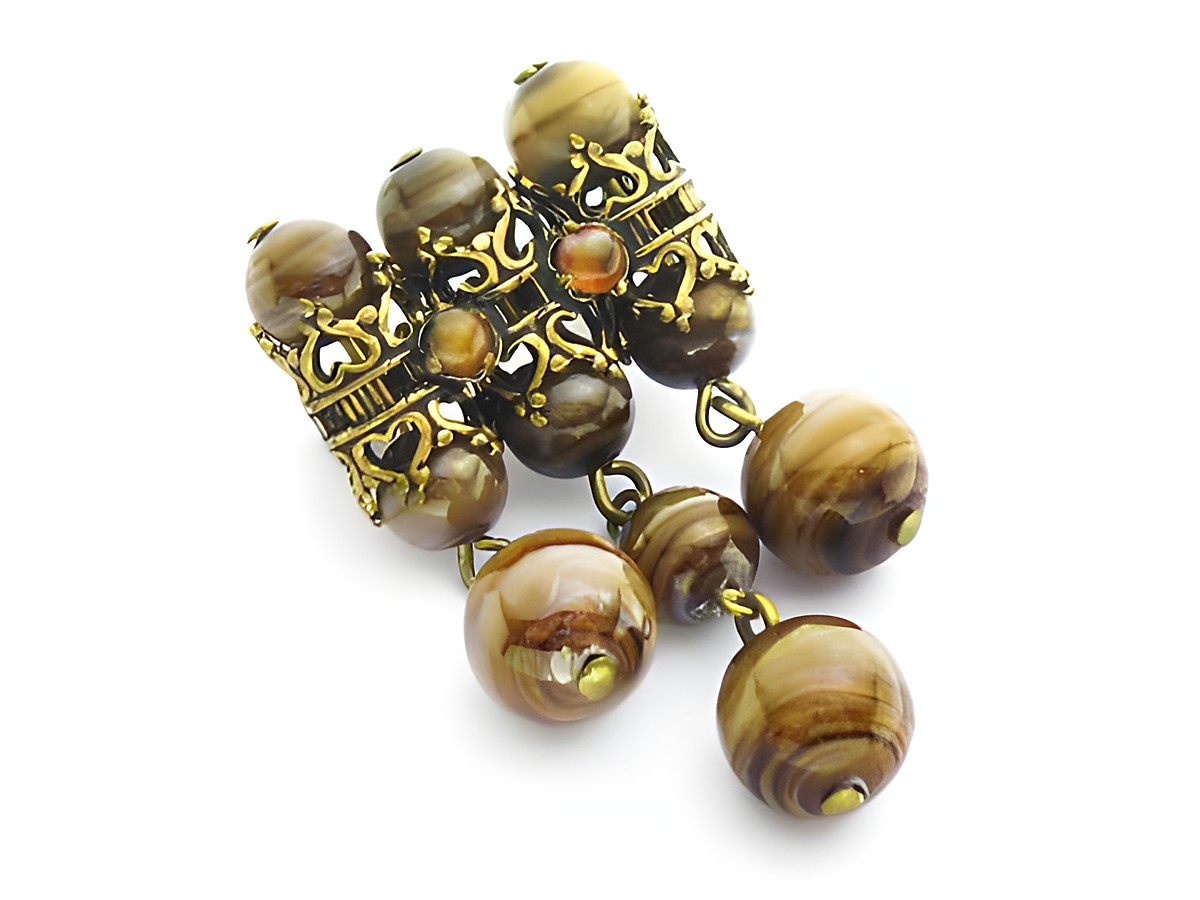 Braune Damen Brosche im sexy City Look mit eleganten, runden Perlen und antikem Design, Hersteller Juwelier Harnisch, hochwertiger Modeschmuck für besondere Anlässe.