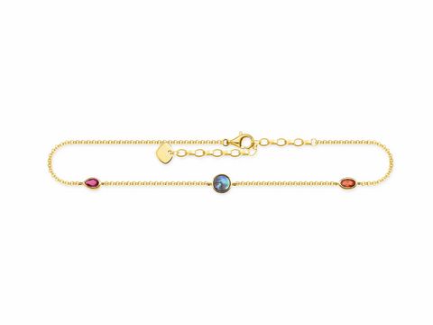 Silberne Fußkette von Thomas Sabo mit gelbgoldenen Akzenten und mehrfarbigen Steinen, fein verarbeitet für eleganten Look, ideal für modische Akzente am Fuß.