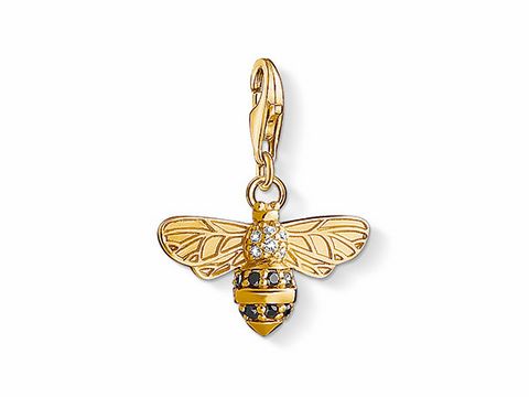 41610157-0 Charm-Anhänger in Form einer Biene aus Edelstahl mit goldener Vergoldung und Zirkonia-Steinen, ideal für persönliche Schmuckstücke. Herstellernummer Thomas Sabo 1449-414-39.