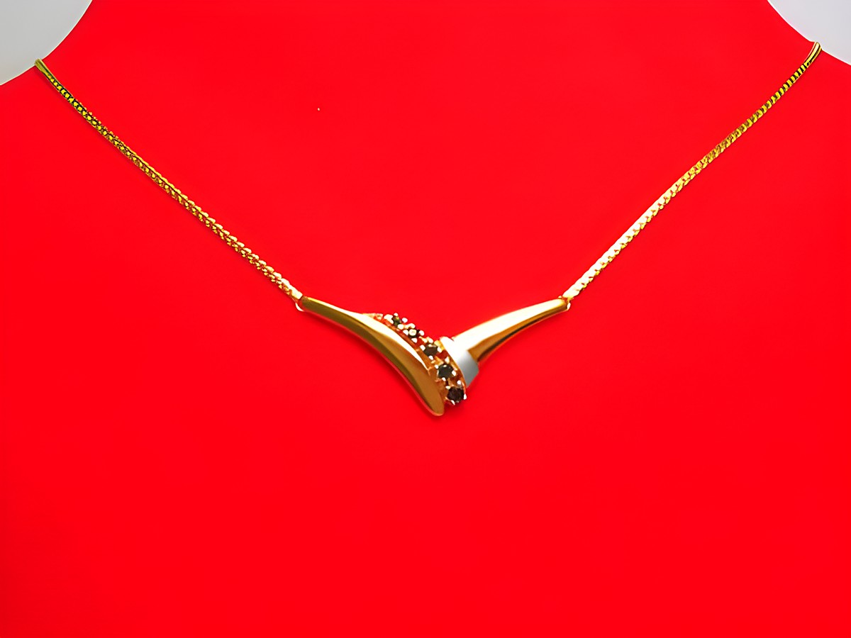 Collier Goldkette 333 Mittelteil bicolor mit Saphir 42cm vom Hersteller Juwelier Harnisch, elegant und geschmackvoll in gold und silber, ideal für besondere Anlässe.