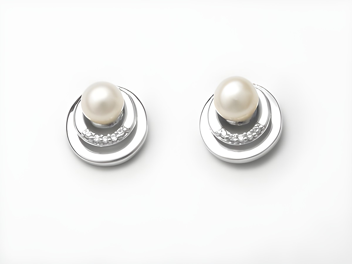 Silber Ohrringe aus Sterling Silber mit traumhaften Zirkonia und Süßwasser Zuchtperlen, designed von Juwelier Harnisch, elegant und schick für jeden Anlass.