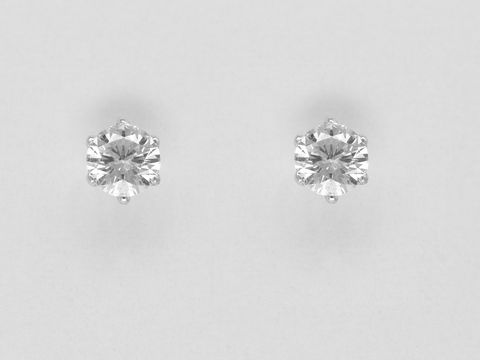 Weißgold Ohrringe in Krappenfassung mit zauberhaftem Brillant 0,25 ct. W/Si Stecker von Juwelier Harnisch, elegant und zeitlos, ideal für jeden Anlass.