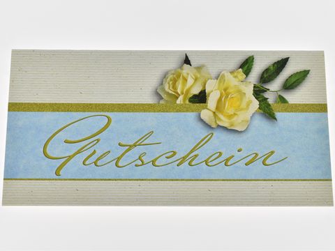 Gutscheinkarte mit dem Text Gutschein, verziert mit gelben Rosen und grünen Blättern, für den Hersteller Juwelier Harnisch. Ideal für besondere Anlässe.