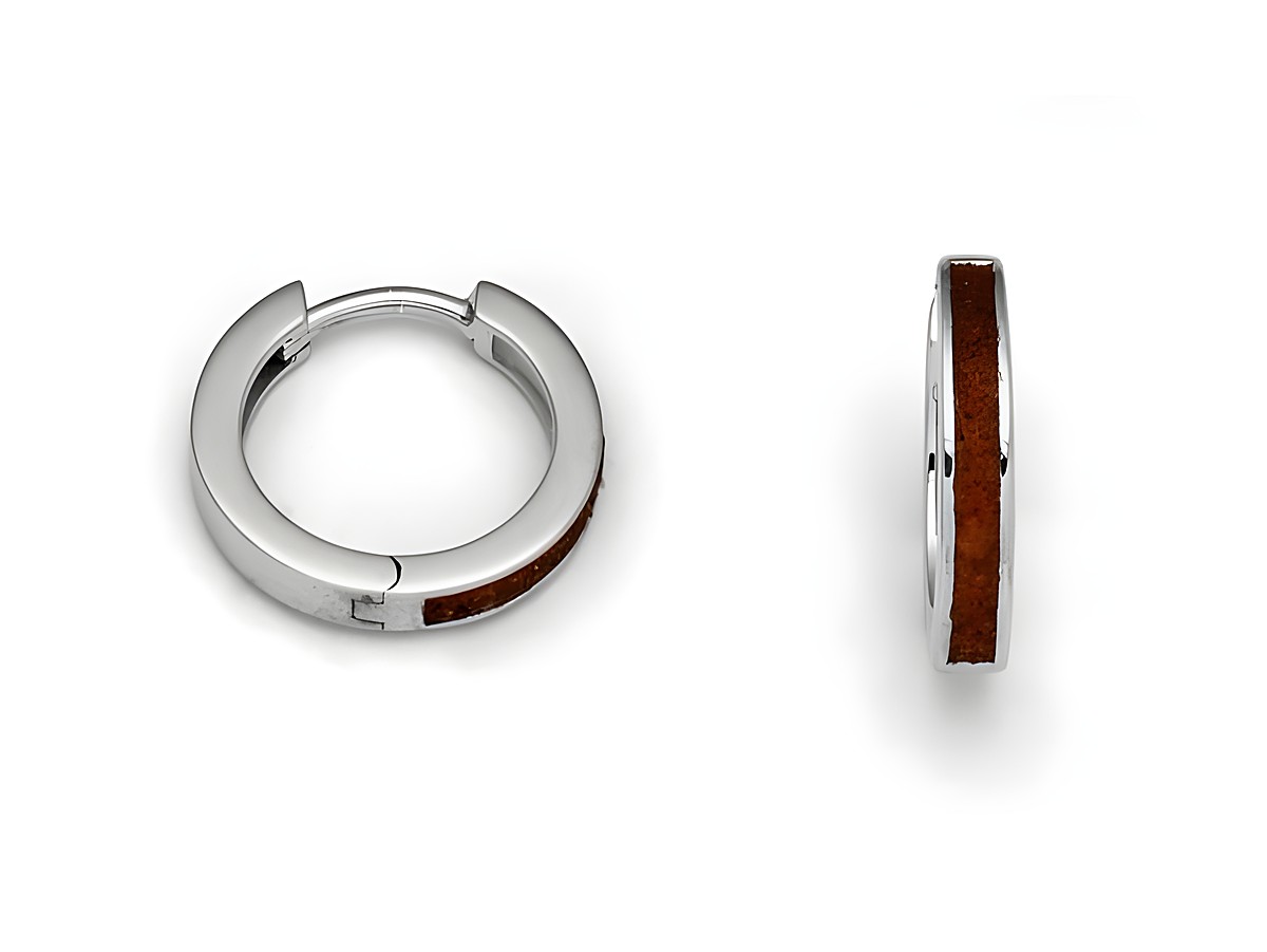 DUR Schmuck O5246 Sterling Silber Ohrringe Marina Creole mit Bernstein zeigen elegante runde Creolen mit einem Teil aus braunem Bernstein und glänzendem Silber. Ideal für jedes Outfit.
