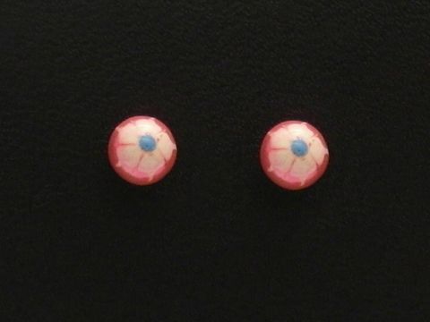 Zwei runde Ohrringe aus Sterling Silber für Kinder, mit einer rosa Blüte und blauen Details, hergestellt von Juwelier Harnisch. Ideal für kleine Mädchen und besondere Anlässe.
