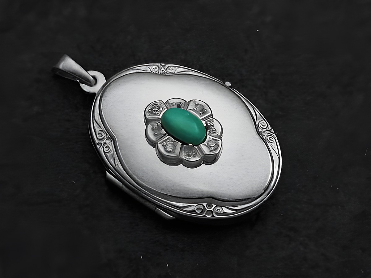 Türkis Medaillon Cabochon aus Sterling Silber mit Brillanten, kunstvoll gearbeitete Oberfläche und florales Design, Hersteller Juwelier Harnisch. Ideal als elegantes Schmuckstück.