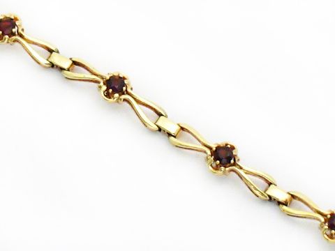 6000011-0 Granat Armband 18,5 cm rund in Silber vergoldet von Juwelier Harnisch, filigranes Design mit granatfarbenen Steinchen, elegantes Schmuckstück für jeden Anlass.