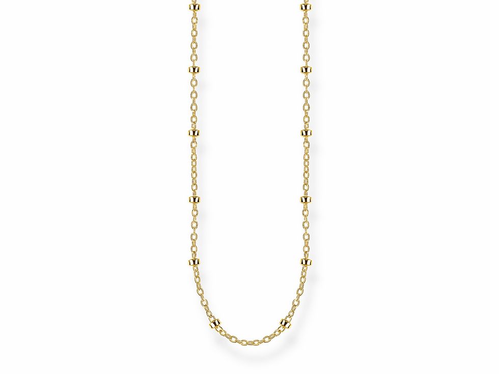 Eine elegante Kette aus vergoldetem Sterling Silber von Thomas Sabo, die ein hochwertiges Design mit glanzvollen Akzenten vereint, ideal für stilvolle Outfits.