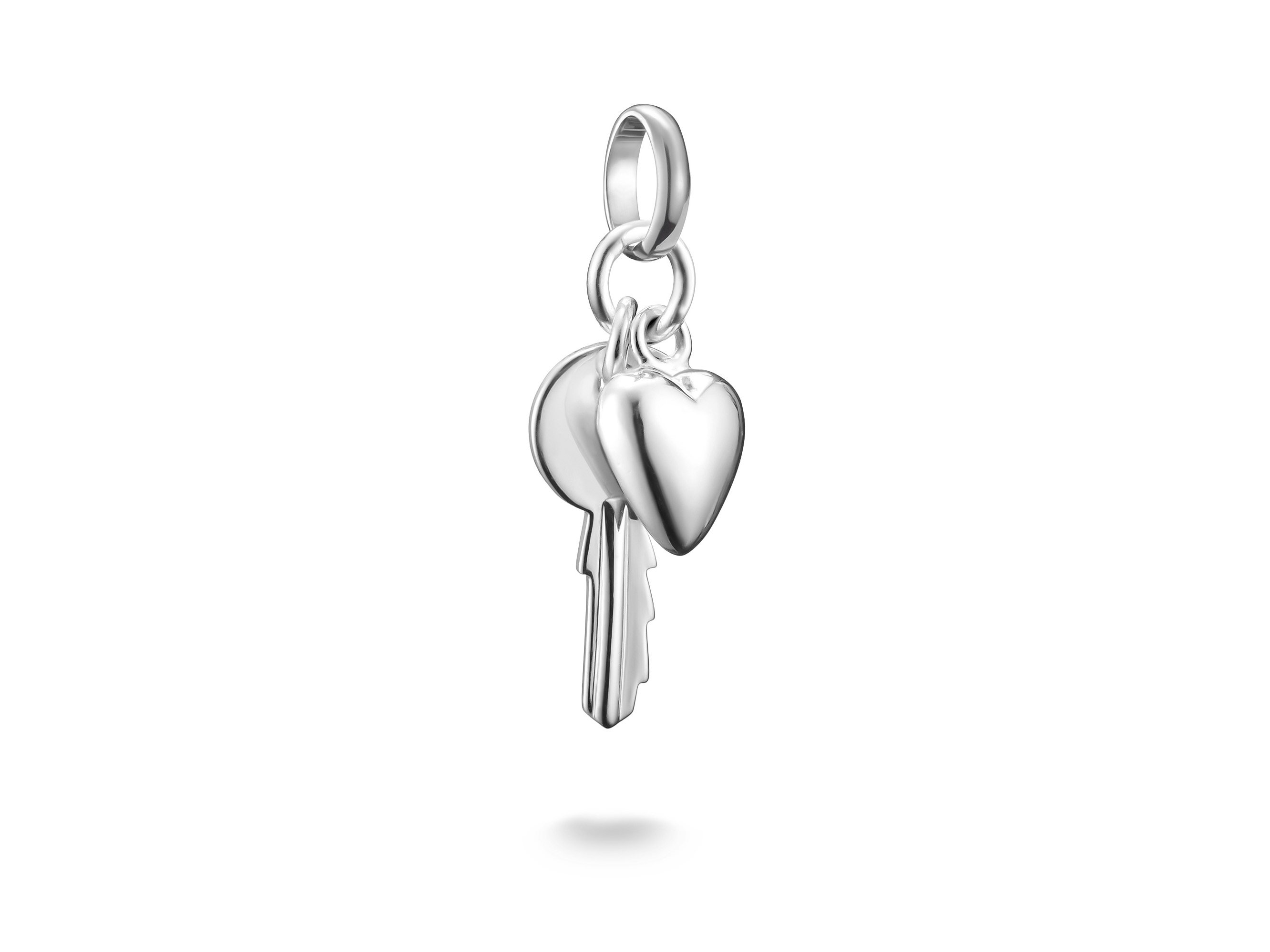 Charm von Thomas Sabo mit einem Schlüssel und einem Herz, gefertigt aus Silber, Teil der Charm Club CONNECT Kollektion, ideal als Schmuckstück oder Geschenk.