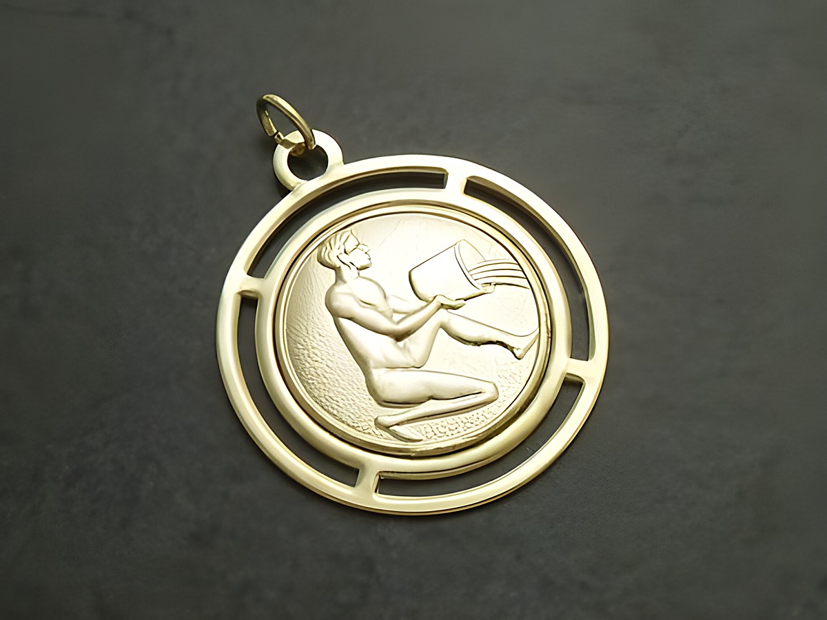 Goldfarbene, runde 3D-Platte mit dem Sternzeichen Wassermann, dargestellt durch eine Figur, die einen Krug hält, hergestellt von Juwelier Harnisch.
