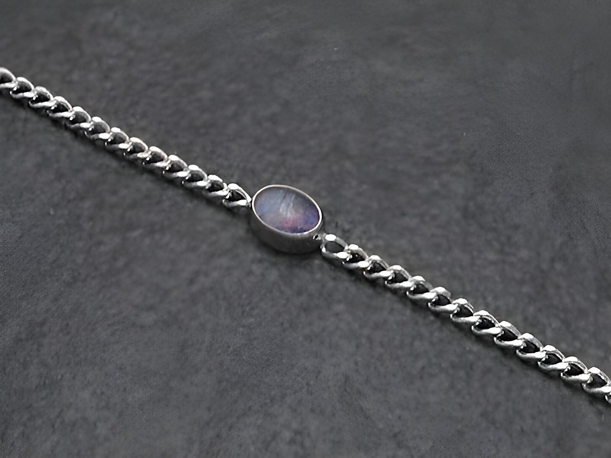 Silber Armband 19cm x 7mm mit einem Opal Triplette, gefertigt vom Juwelier Harnisch, bietet eleganten Schmuck mit einem funkelnden Akzent in der Mitte.