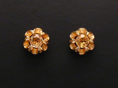 45873-0 Ohrringe mit Citrin in blütenförmigem Design, gefertigt aus Gold, Hersteller Juwelier Harnisch, weitere Steine sind kunstvoll eingefasst. Ideal für elegante Anlässe.