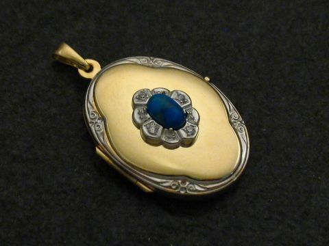 Howlite türkis Medaillon Cabochon Gold 585 bicolor mit Brillanten, Juwelier Harnisch, Gelbgold 585, elegantes Design und liebevolle Details für einen besonderen Schmuckmoment.