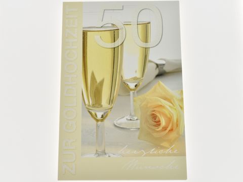Hochzeitskarte mit dem Text zur Goldhochzeit, zwei Sektgläser gefüllt mit Sekt und eine zarte Rose im Vordergrund, Hersteller Juwelier Harnisch, ideal für feierliche Anlässe.