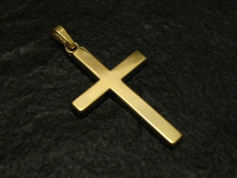Ein schlichtes Goldkreuz aus Gold 333 mit den Maßen 31x19x1,8mm, hergestellt von Juwelier Harnisch, in klassischem Design.