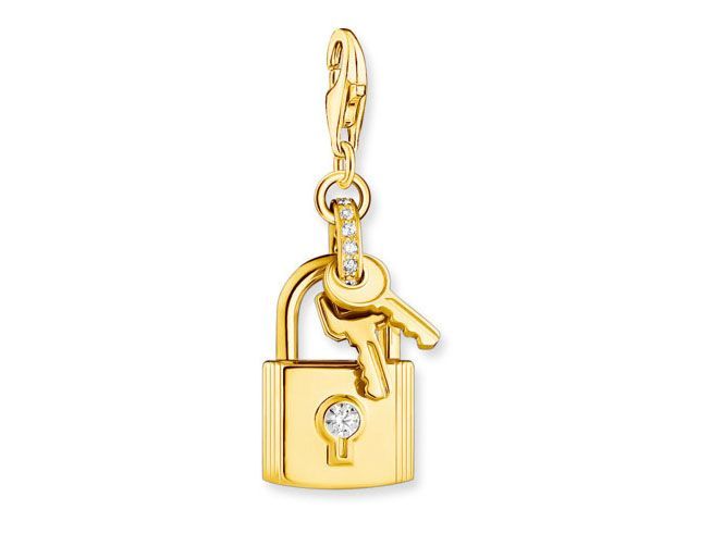 Charm-Anhänger von Thomas Sabo in Form eines Schlosses und eines Schlüssels aus vergoldetem Sterling Silber mit weißen Zirkonia, bicolor in Gelbgold, elegant und stilvoll.