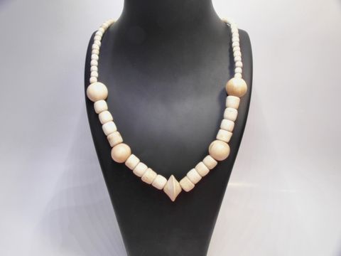 Holzkette Multiform 20 mm naturbraun 60 cm aus Holz, Schmuck von Juwelier Harnisch, elegant und zeitlos, ideal für jeden Anlass, liebevoll gestaltet und sorgfältig verarbeitet.