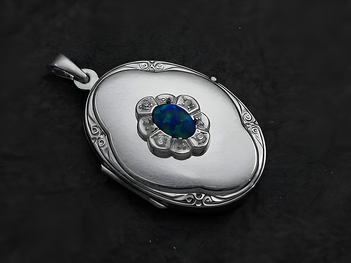 Opal syn blau Medaillon Cabochon aus Sterling Silber mit Zirkonia von Juwelier Harnisch, ovaler Anhänger mit filigraner Blütenoptik um den leuchtenden Stein.