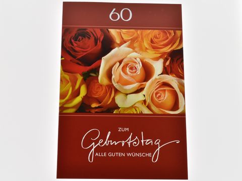 Geburtstagskarte mit ansprechendem Rosenblüten-Design in warmen Farben, mit dem Aufdruck zum Geburtstag und den besten Wünschen, Hersteller Juwelier Harnisch.