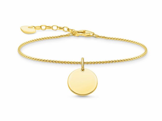 Ein Thomas Sabo Gravur Armband aus Silber mit vergoldetem runden Anhänger bietet eine elegante und personalisierbare Schmuckoption. Die Länge beträgt 16-19 cm.