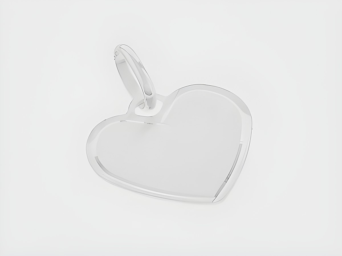 Silber Gravurplatte in Herzform aus Silber, schlichtes und romantisches Design, hergestellt von Juwelier Harnisch. Ideal für persönliche Gravuren und Geschenke.