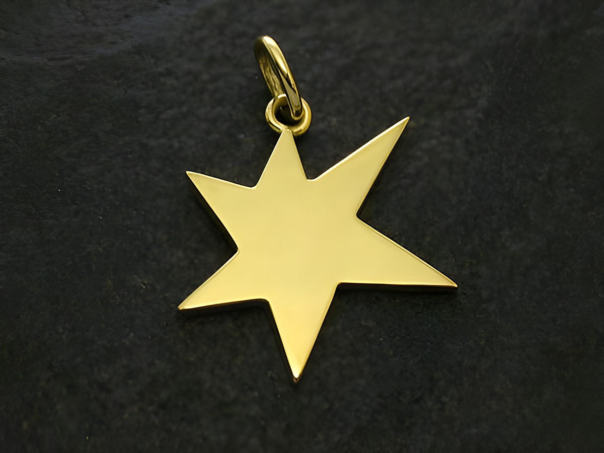 Stern Anhänger aus Gold 750, hergestellt von Juwelier Harnisch, in Form eines stilisierten Sterns, ideal für Schmuckliebhaber und als besonderes Accessoire.