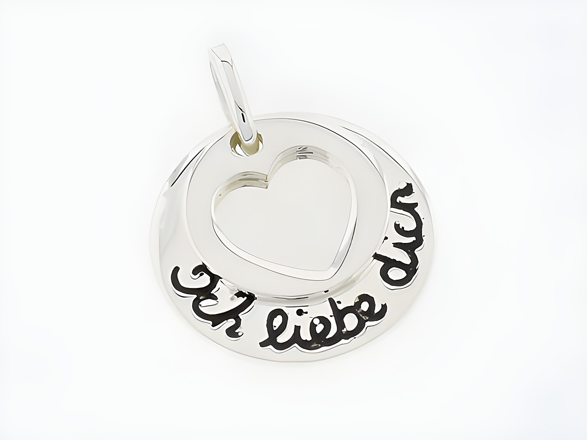 Rund mit Herzchen Silber Gravurplatte mit der Aufschrift Ich liebe dich, aus Lack, Hersteller Juwelier Harnisch, mit geschwungenem Motiv für romantische Anlässe.