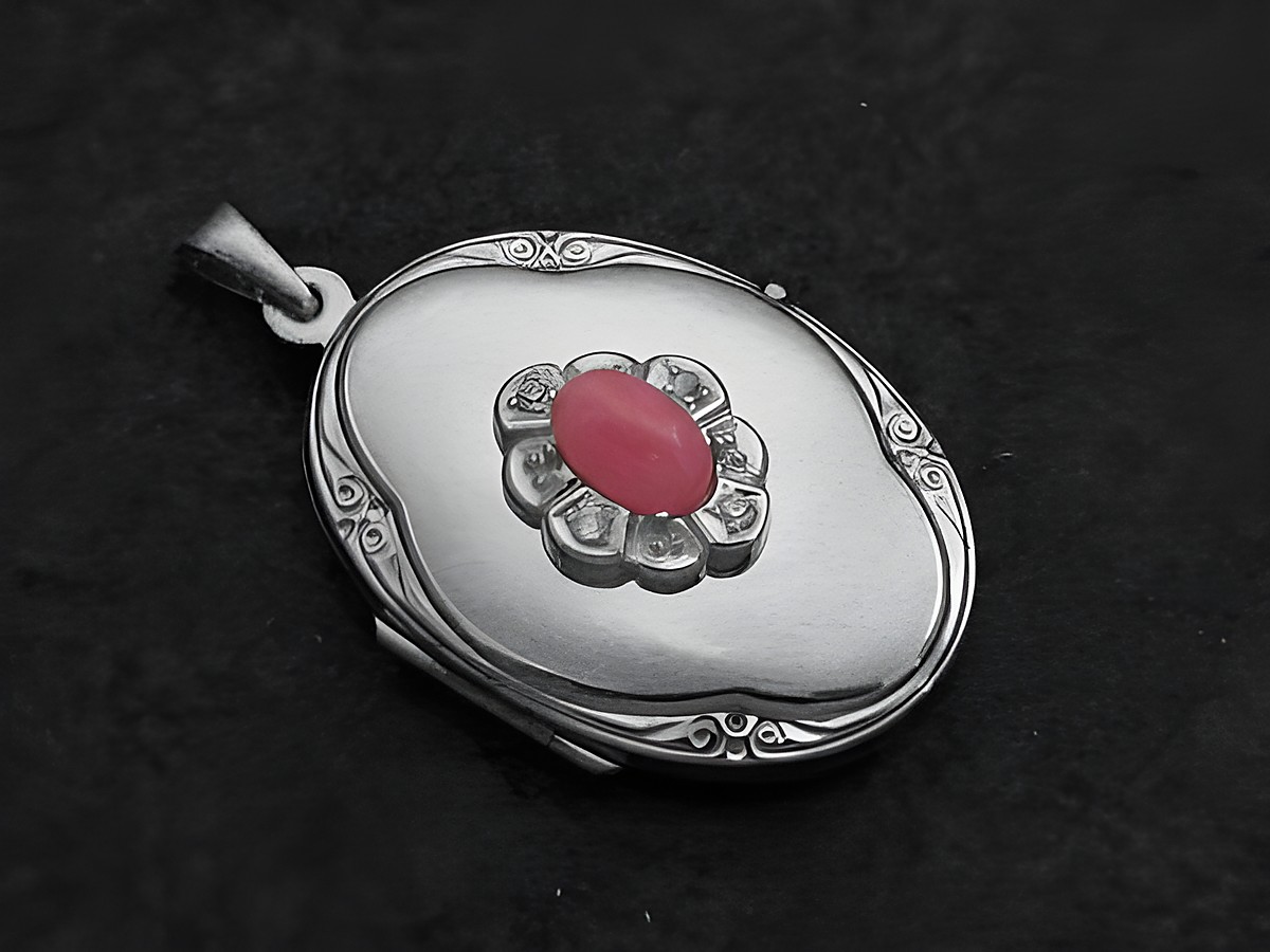 Rhodochrosit rosa Medaillon Cabochon aus Sterling Silber mit Brillanten, geschmackvolles Design, gefertigt vom Juwelier Harnisch, ideal für stilvolle Akzente.